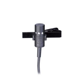 Foto: schwarze Mikrofon-Kapsel mit Kabel und Klemme